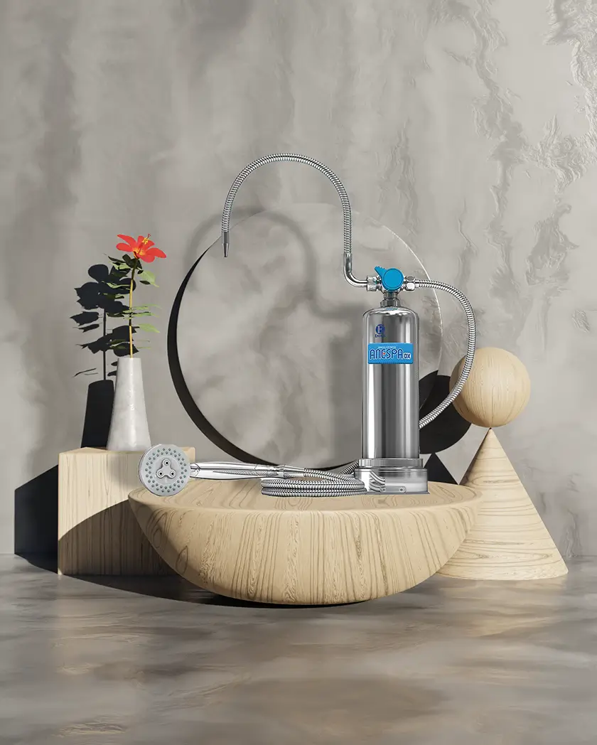 Sistem shower mineral Anespa DX dari Enagic untuk perlindungan kulit dan rambut.